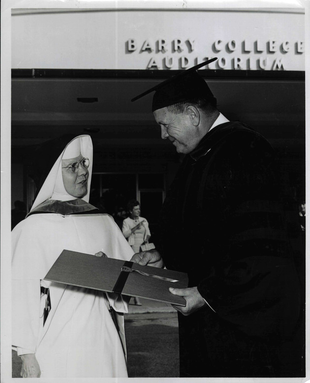 Sister Dorothy Browne, O.P., speaks with General Lewis Walt outside the Broad Auditorium